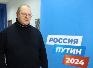 Мельниченко отдал подпись в поддержку Путина